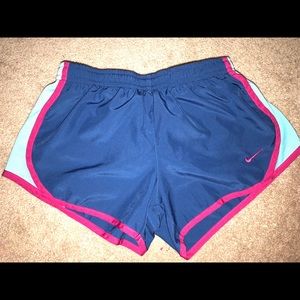 Girls blue and pink nike running shorts